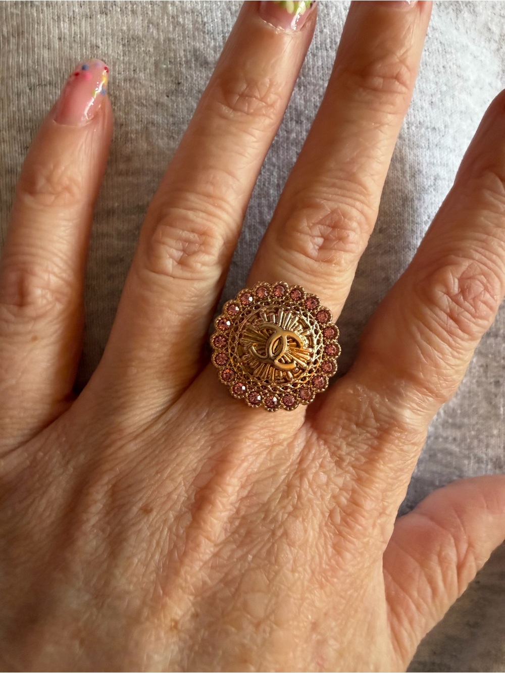 Upcycled Chanel button ring Gold Tone Ring with Pink Crystals